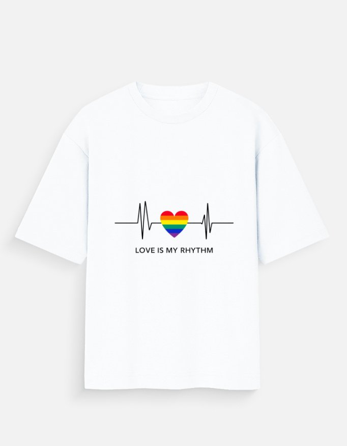 Girl Wearing White Pride Heart T-Shirt in Cozy Cafe - Image 5